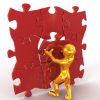Goldener Mensch fügt Puzzlestück in rotes Puzzle ein, symbolisiert Teamarbeit und Problemlösung.